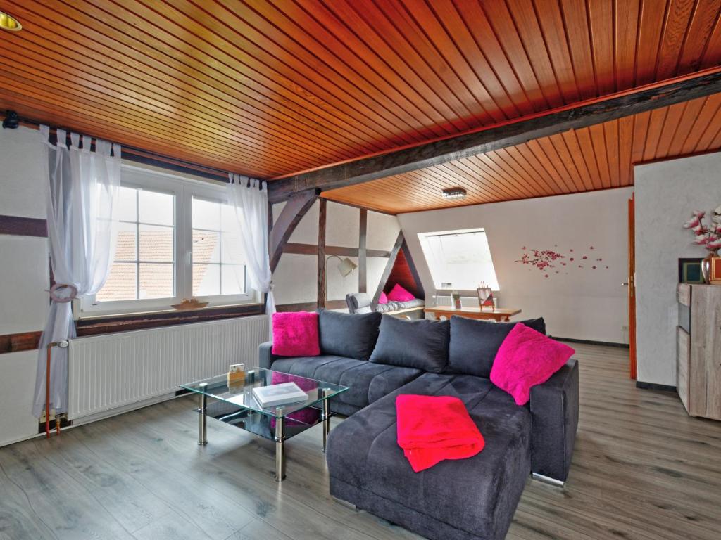 a living room with a couch and a table at Apartment Born 3 by Interhome in Schieder-Schwalenberg
