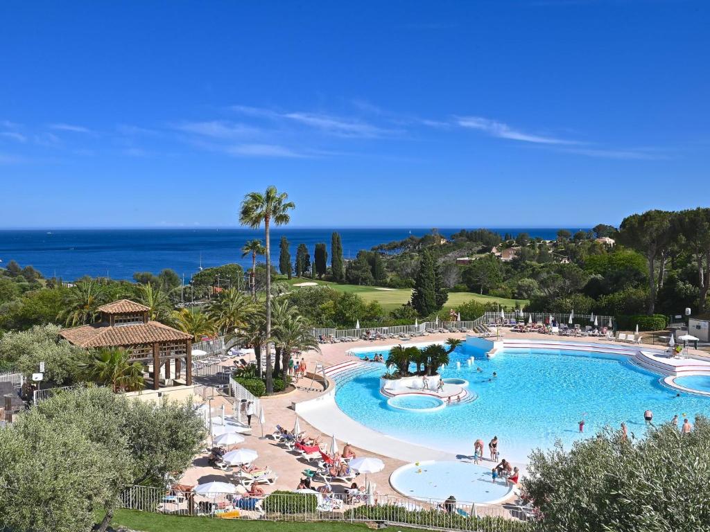 a view of a pool at a resort at Apartment Village Cap Estérel - L&#39;Esquinade-23 by Interhome in Agay - Saint Raphael