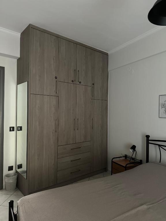 Ένα ή περισσότερα κρεβάτια σε δωμάτιο στο Iris Apartment Nafpaktos