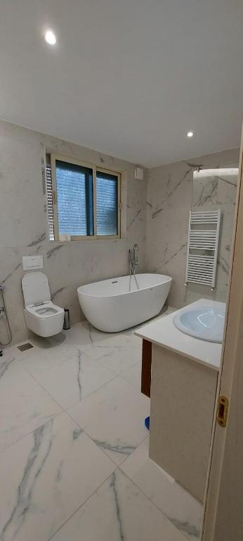 Koupelna v ubytování Hotel SHahini