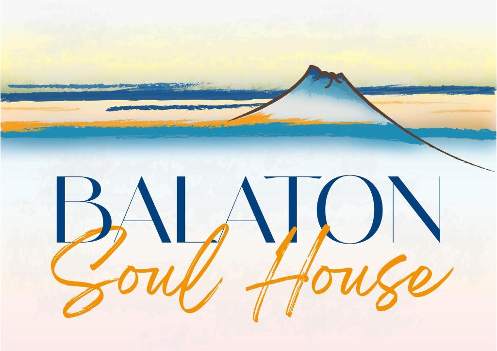 un cartello per una casa soul locanda con un aquilone di Balaton Soul House a Vonyarcvashegy