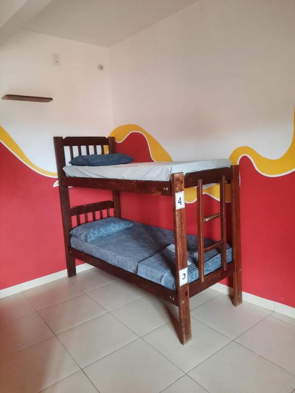 Postel nebo postele na pokoji v ubytování Chapada Backpackers Hostel Agência