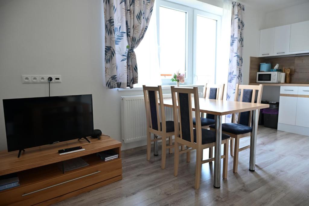 Kuchyň nebo kuchyňský kout v ubytování Apartmány Zara