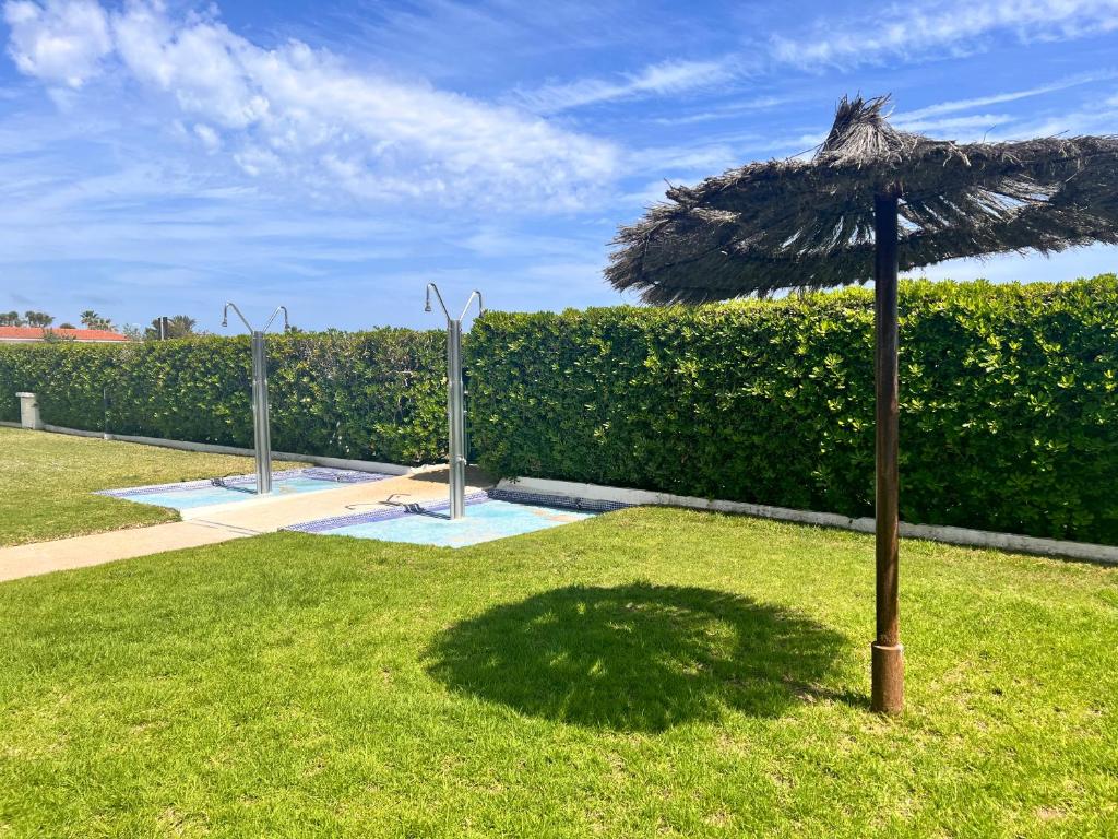 Jardín al aire libre en Apartamento completo frente al mar