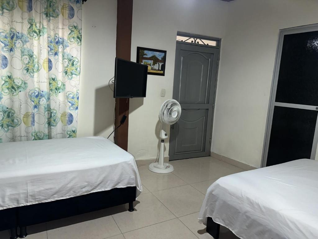 Postel nebo postele na pokoji v ubytování Las Camelias Apartahotel
