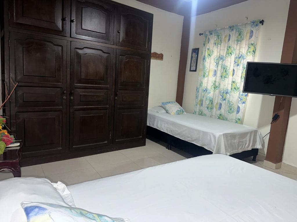 Postel nebo postele na pokoji v ubytování Las Camelias Apartahotel