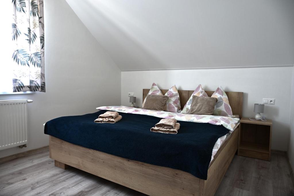 Postel nebo postele na pokoji v ubytování Apartmány Zara