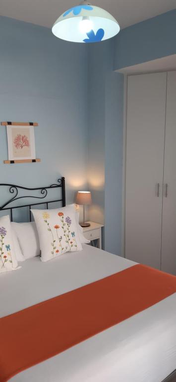 Postel nebo postele na pokoji v ubytování Acogedor Apartamento Ribeira Sacra