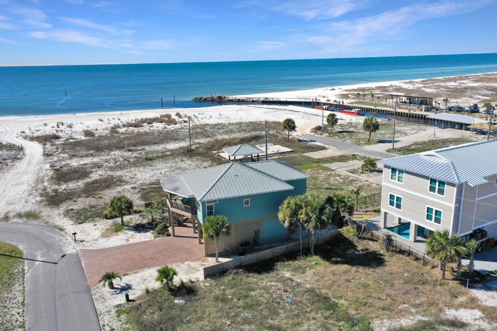 an aerial view of a house and the beach at The Blue Turtle by Pristine Properties Vacation Rentals in Mexico Beach