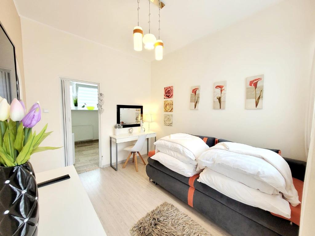 Posteľ alebo postele v izbe v ubytovaní Apartamenty Cudowna Wyspa