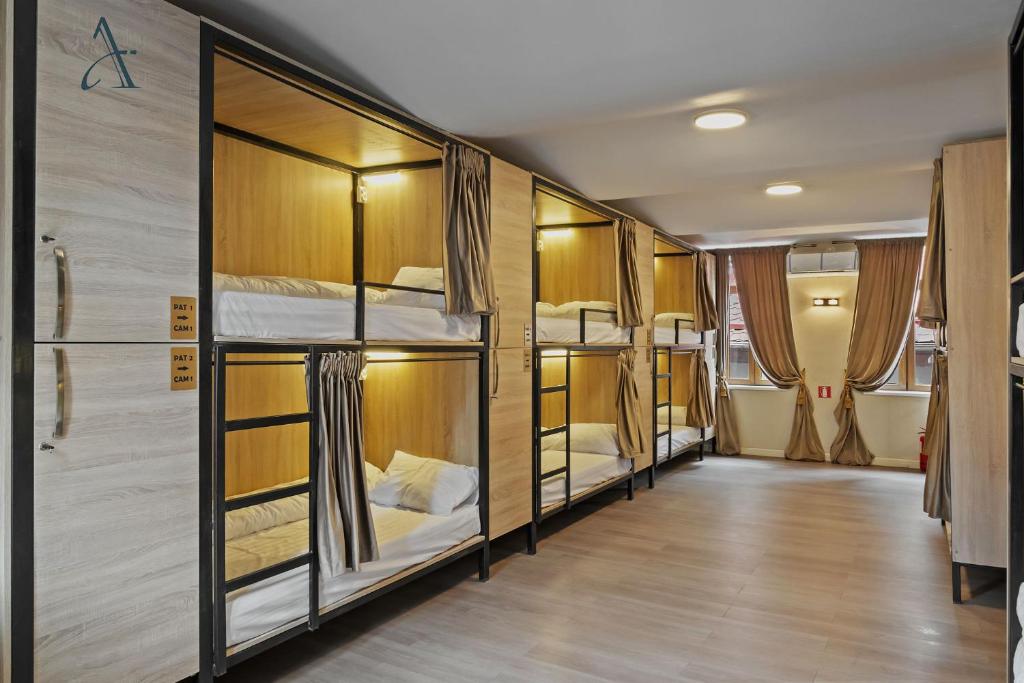 Postel nebo postele na pokoji v ubytování Ramana Garden Hostel - Self-Service Accommodation