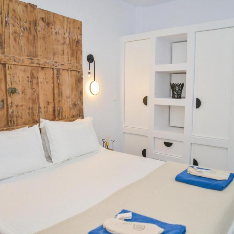 Postel nebo postele na pokoji v ubytování Dream on Adamas Milos