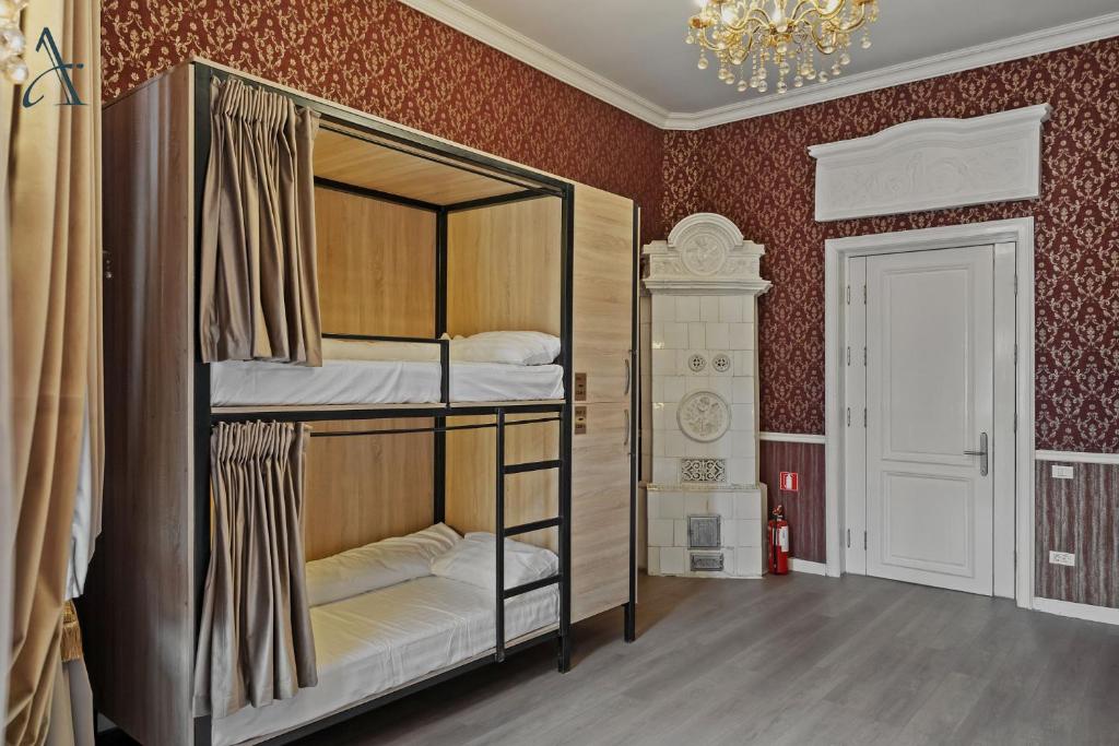 Postel nebo postele na pokoji v ubytování Ramana Garden Hostel - Self-Service Accommodation