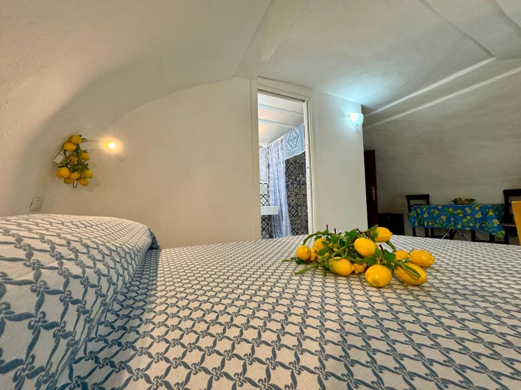 Ένα ή περισσότερα κρεβάτια σε δωμάτιο στο La Casa di Nina