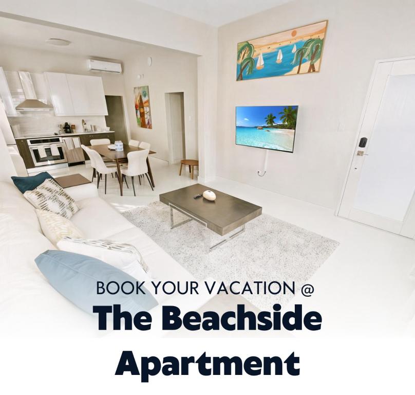 a living room with a couch and a table at Luxurious Beachside 3-Br Apt in San Juan