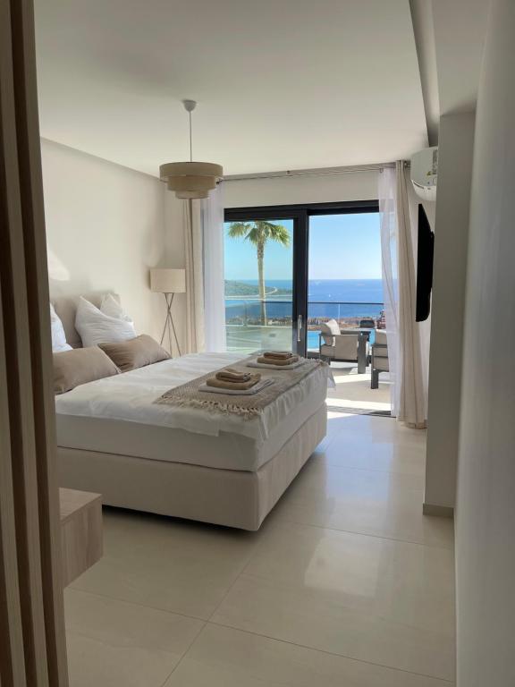 Katil atau katil-katil dalam bilik di Primosten Resort Sunhill Deluxe Apartment Lea