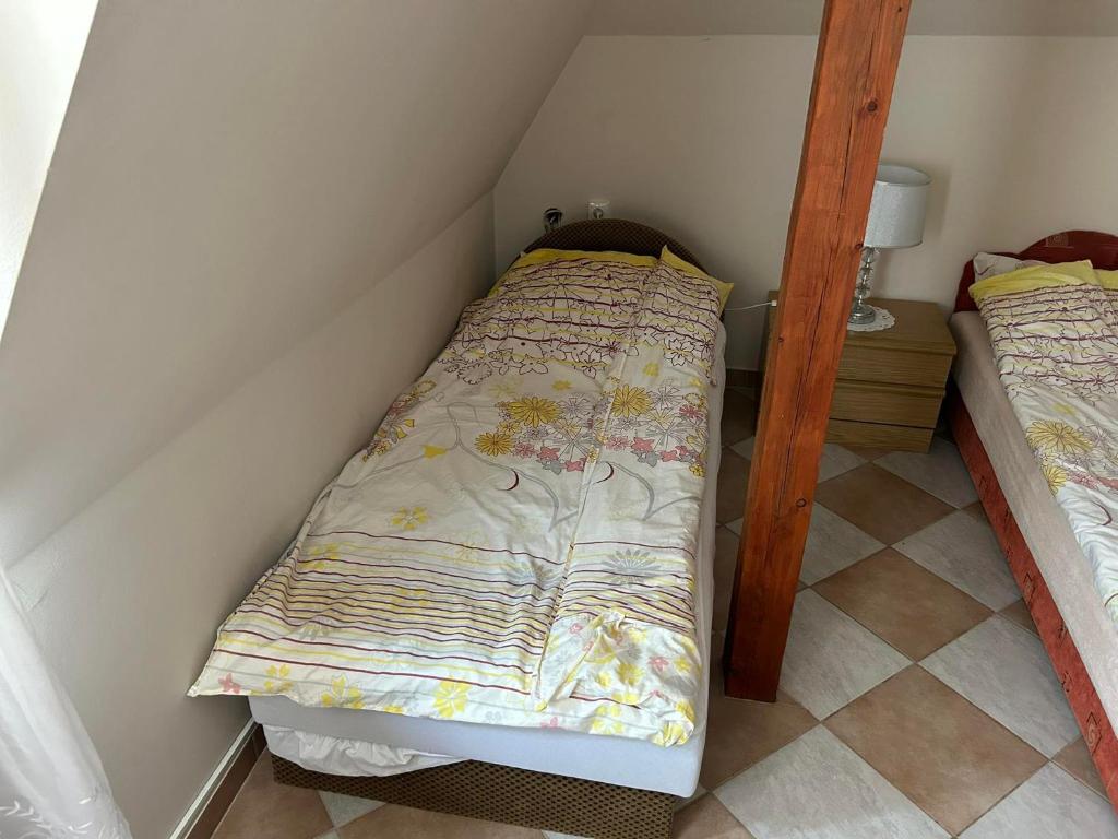 Postel nebo postele na pokoji v ubytování Mézesvölgy Vendégház