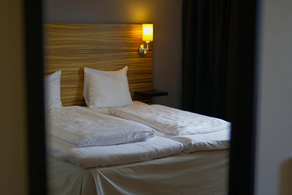 Postel nebo postele na pokoji v ubytování Comfort Hotel Jönköping