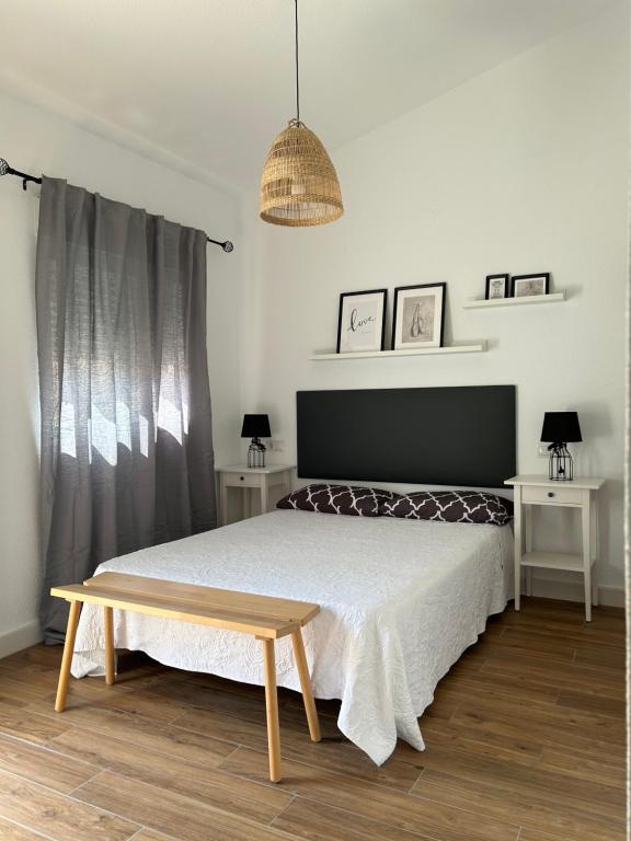 A bed or beds in a room at Villa Alicia