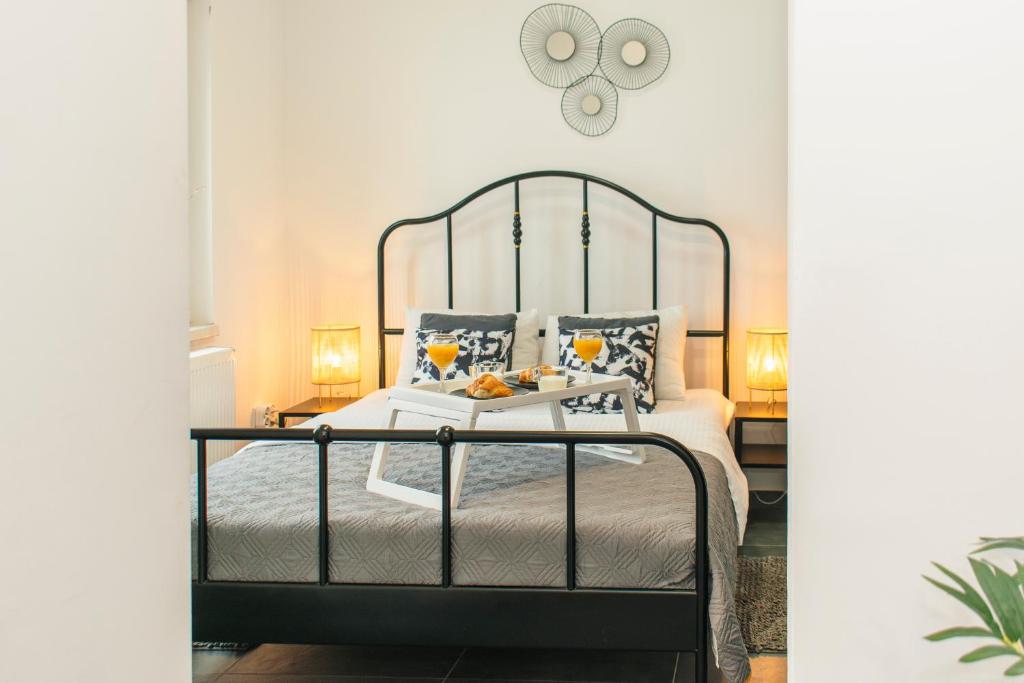 Postel nebo postele na pokoji v ubytování GoodLife Studio Apartment
