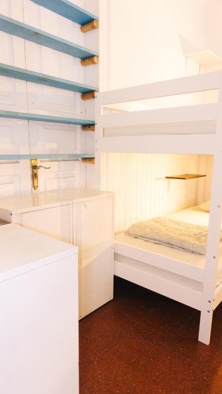 Postel nebo postele na pokoji v ubytování Agüita House