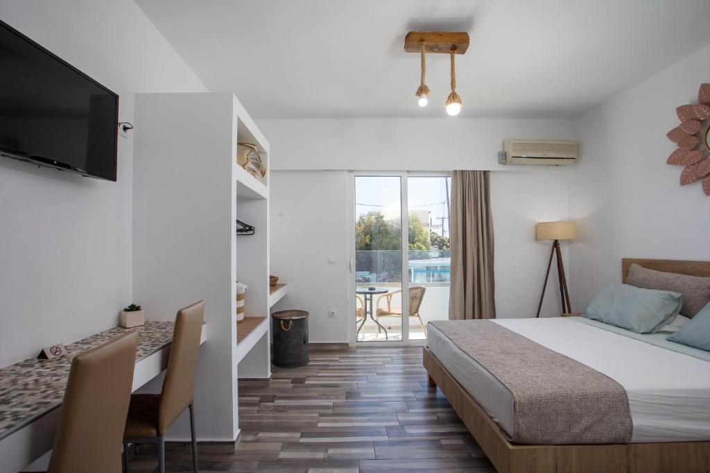 Postel nebo postele na pokoji v ubytování Lisabeth Apartments