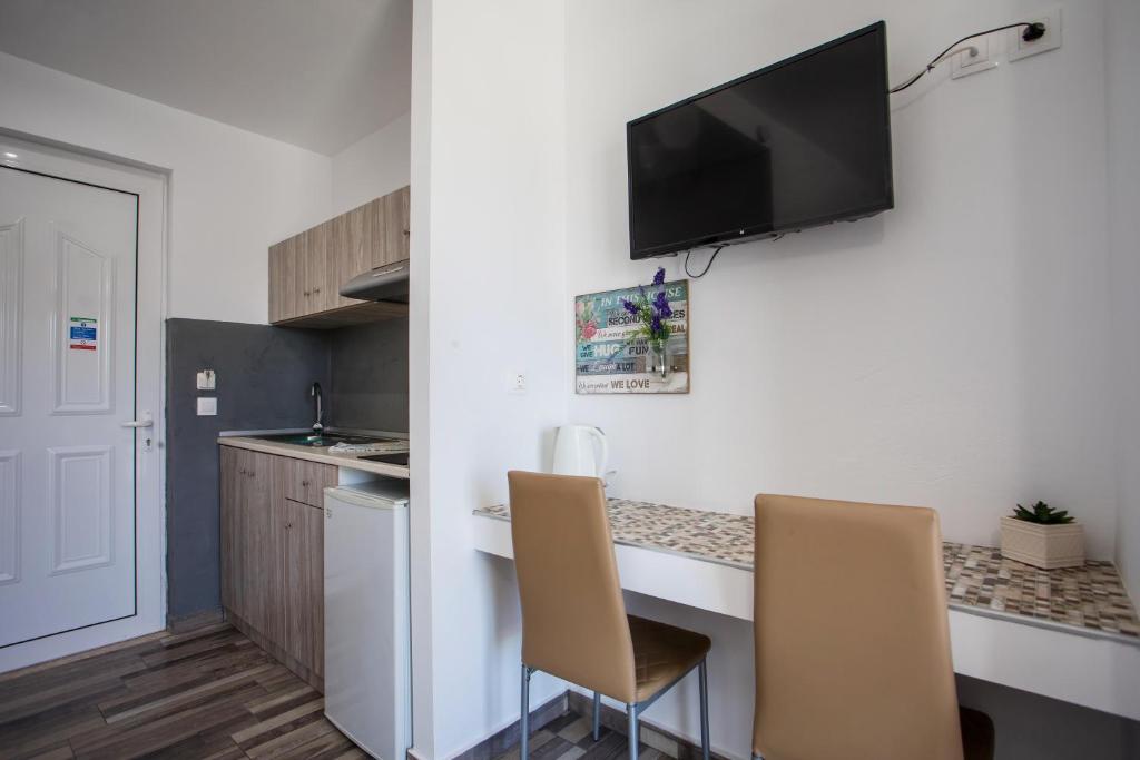 Kuchyň nebo kuchyňský kout v ubytování Lisabeth Apartments