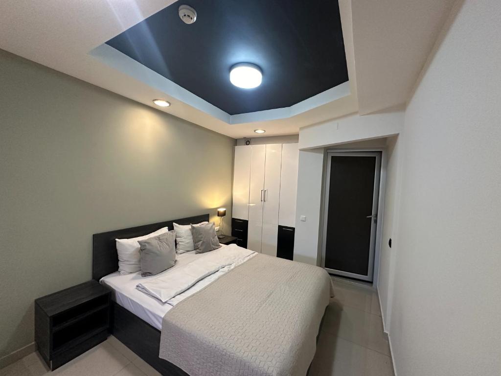 Postel nebo postele na pokoji v ubytování NAVA Hotel Yerevan