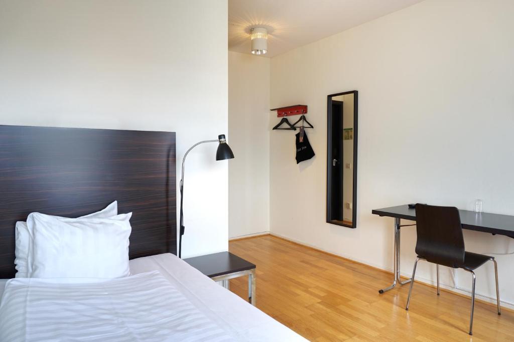 Postel nebo postele na pokoji v ubytování Comfort Hotel Jönköping