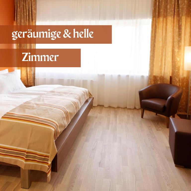 Postel nebo postele na pokoji v ubytování Hotel Lava Inn - 24 h Check-In - Nähe LKH, Landeskrankenhaus, Feldbach