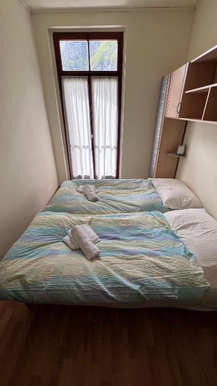 Postel nebo postele na pokoji v ubytování Grott Di Baloi