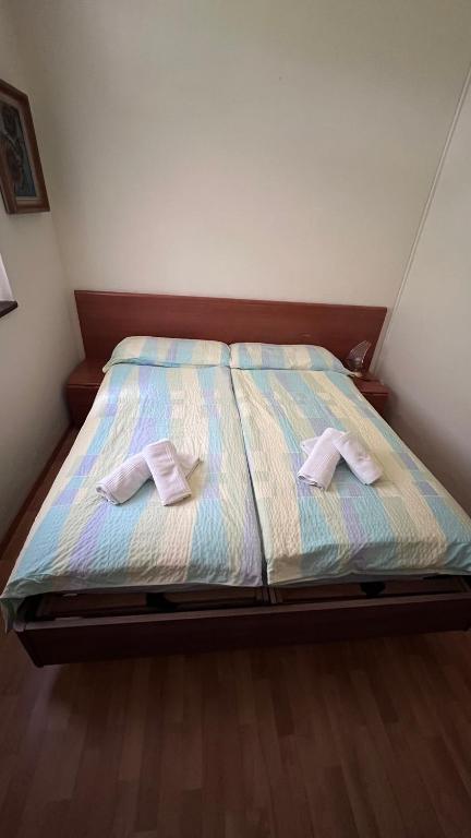 Postel nebo postele na pokoji v ubytování Grott Di Baloi