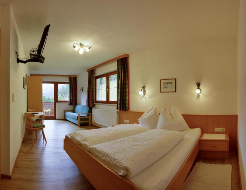 Postel nebo postele na pokoji v ubytování Doadlerhof