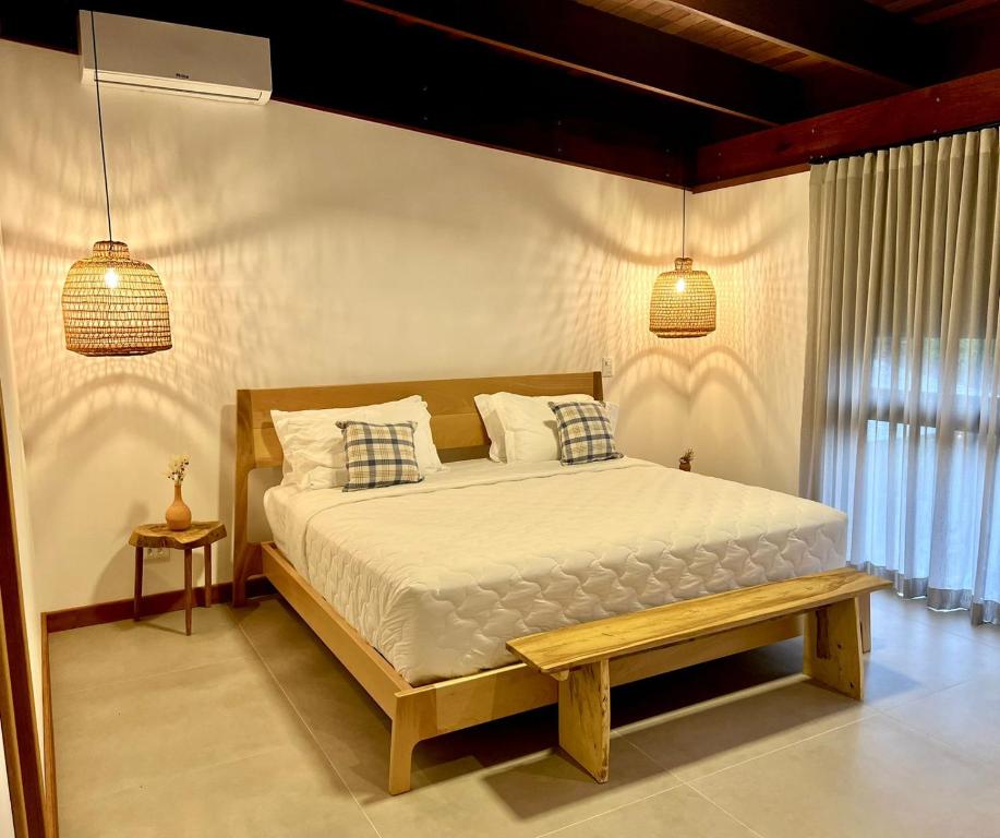 En eller flere senge i et værelse på Ybá Casa Hotel Ilha do Mel