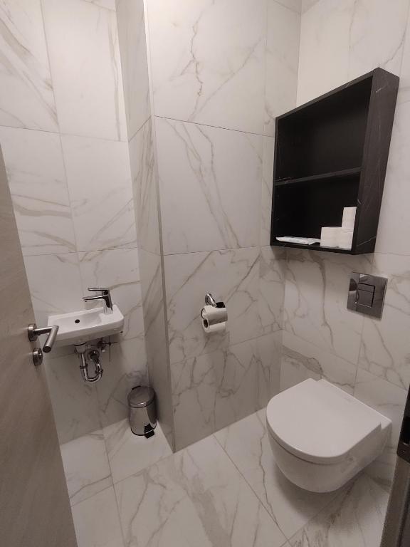 Koupelna v ubytování Belvaros Resort Apartman & Spa