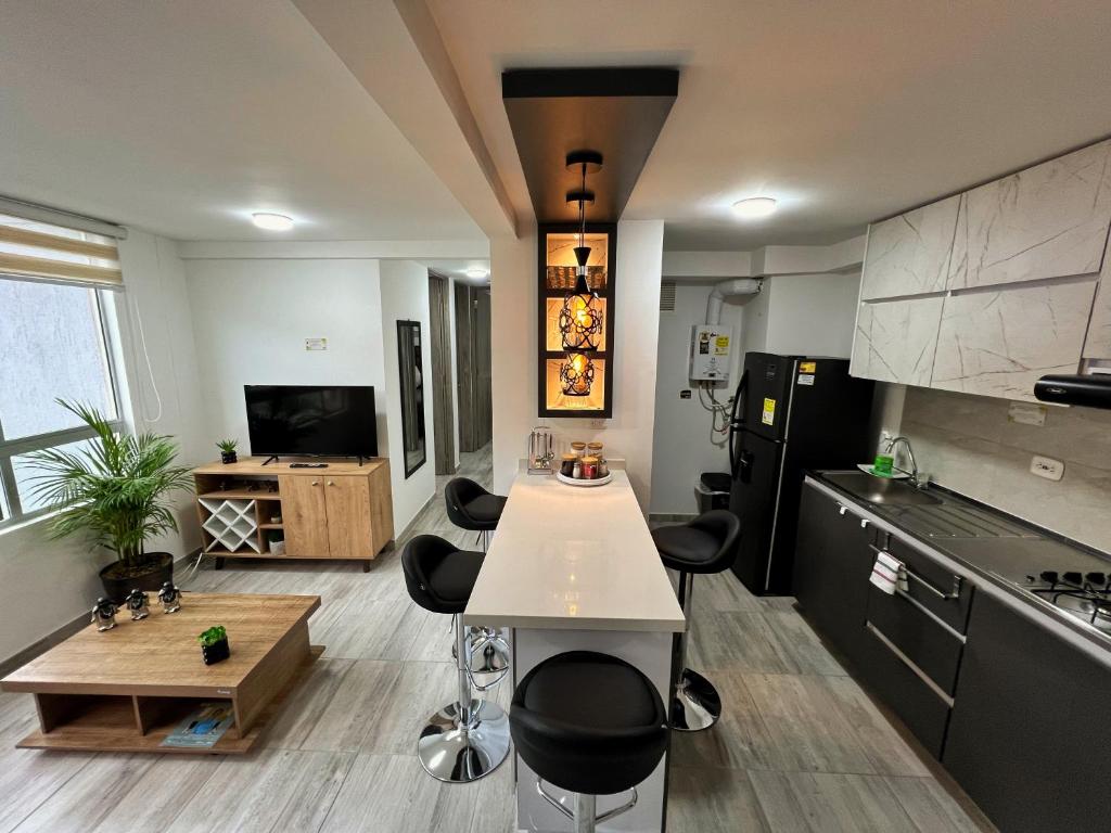 Kuchyňa alebo kuchynka v ubytovaní Apartamento nuevo contiguo a estación de buses