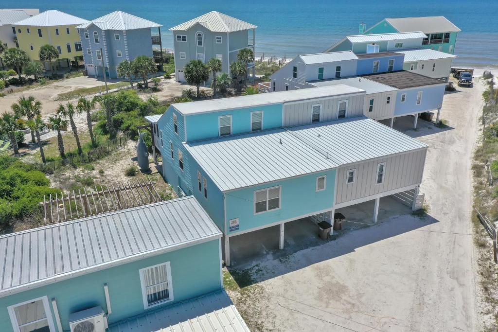an overhead view of a row of houses on the beach at Sharkey's by Pristine Properties Vacation Rentals in Cape San Blas