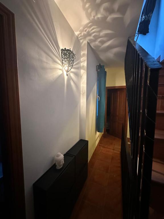 TV a/nebo společenská místnost v ubytování Casita del Barranco lunar