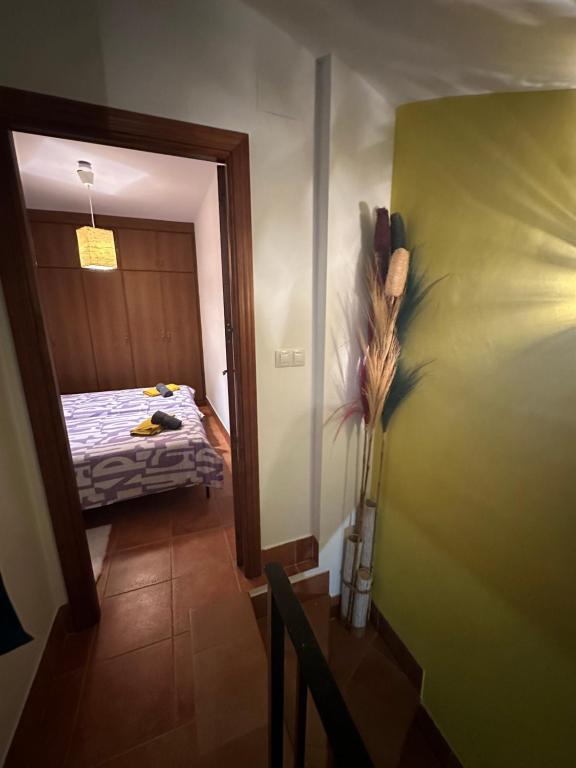 Postel nebo postele na pokoji v ubytování Casita del Barranco lunar