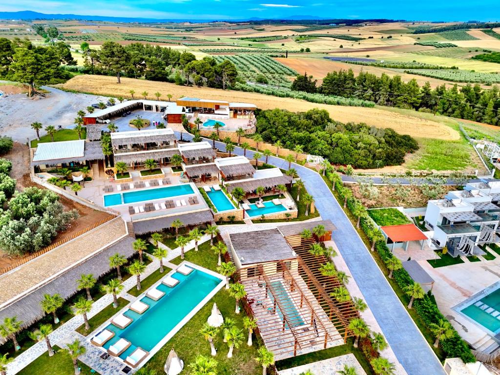 an aerial view of a resort with a swimming pool at SANIMAR By Mono Alex in Kassandra