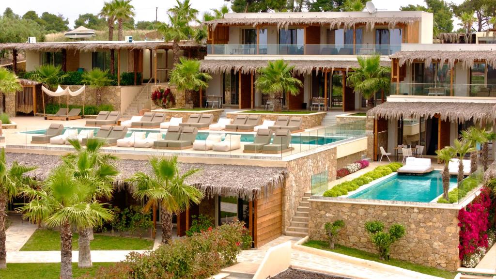 an aerial view of a resort with a swimming pool at SANIMAR By Mono Alex in Kassandra