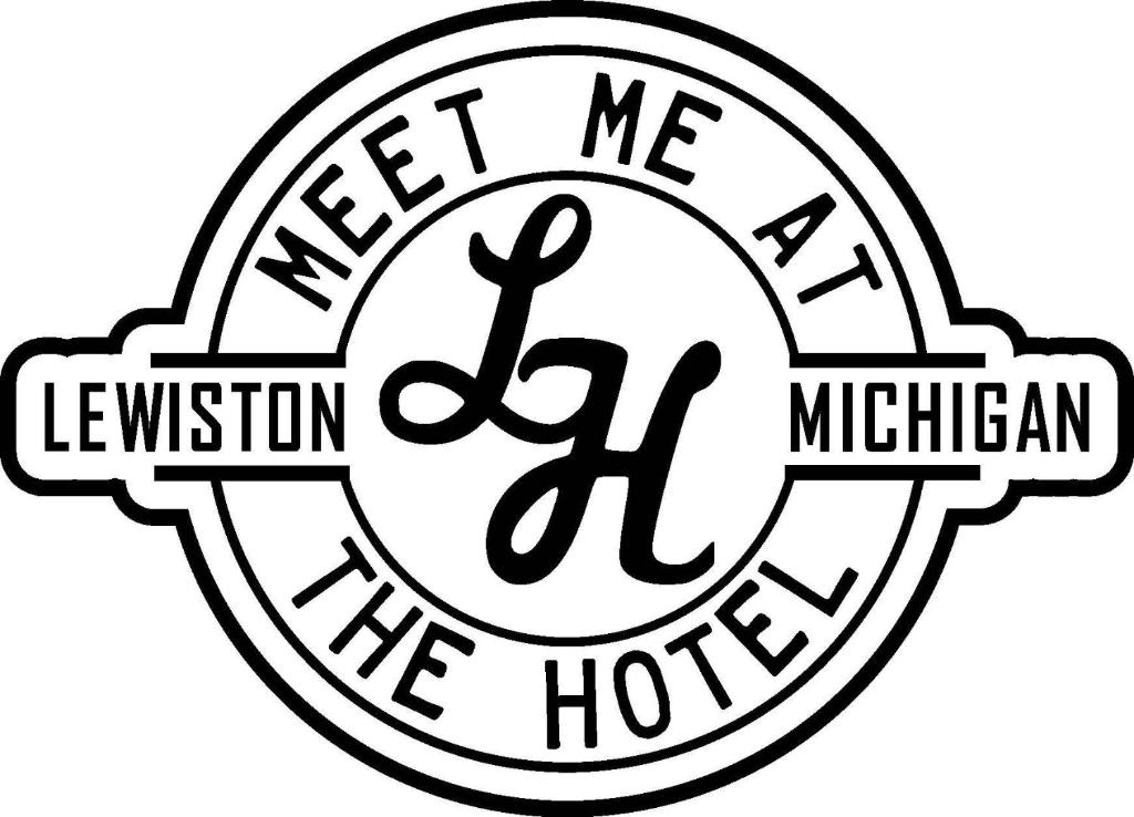 a black and white emblem with the text meet me in the kitchen at Lewiston Hotel Bar & Grill in Lewiston