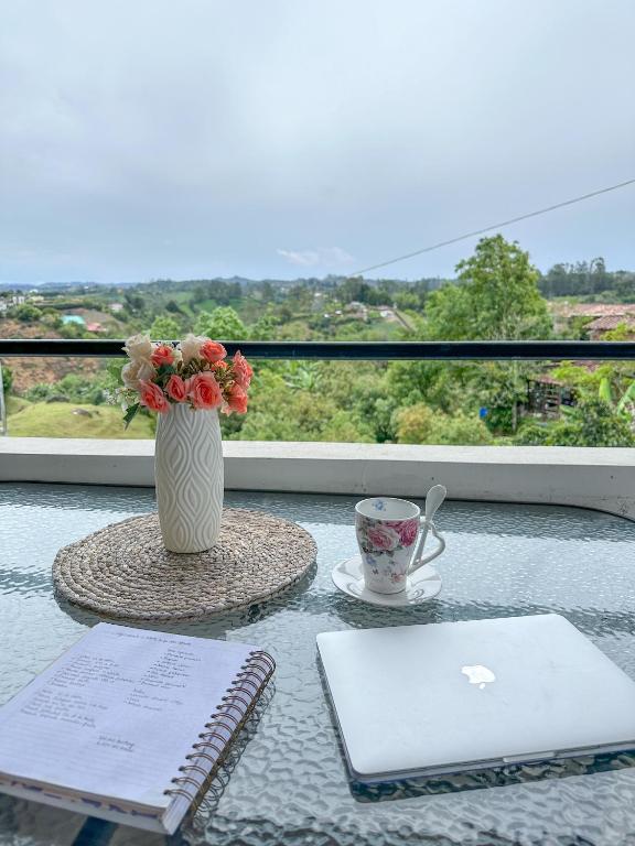 Balkón nebo terasa v ubytování Cabañas con jacuzzi y chimenea - Casa Floral, Marinilla