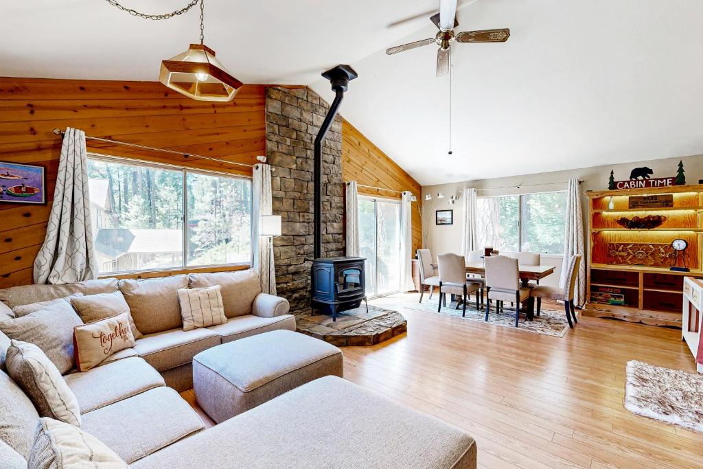 a living room with a couch and a table at The Venado House in Arnold