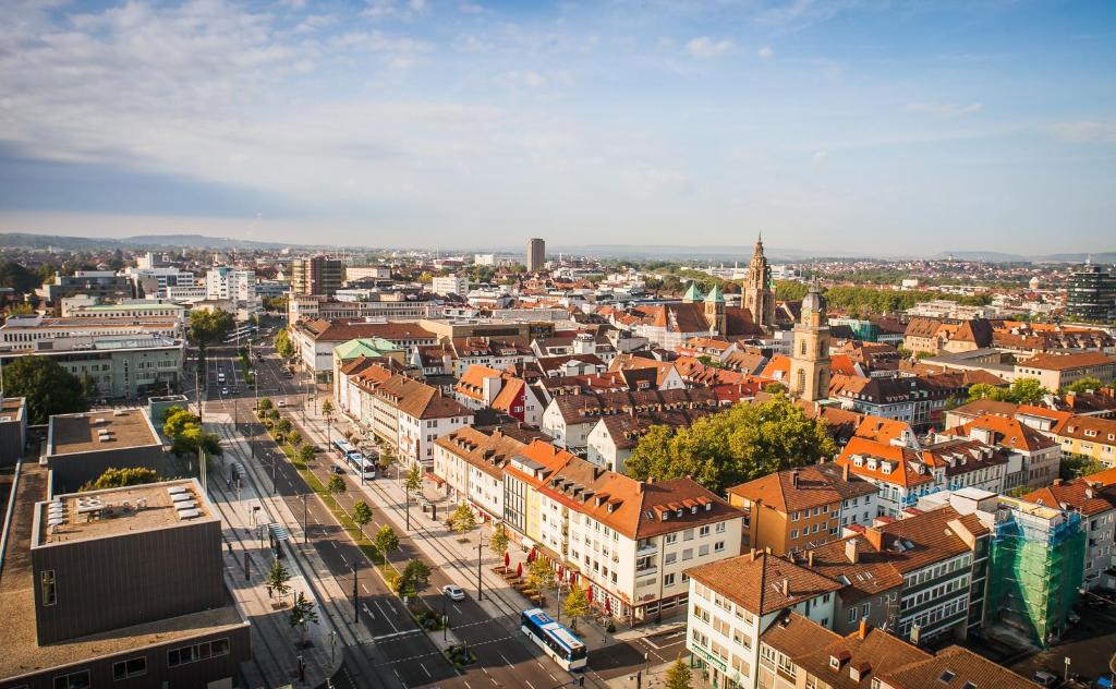 an aerial view of a city with buildings at City Hotel Heilbronn in Heilbronn