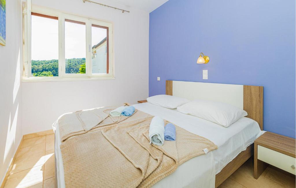 Posteľ alebo postele v izbe v ubytovaní Nice Apartment In Kampor With Wifi