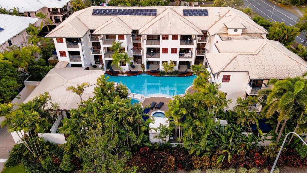 an aerial view of a resort with a swimming pool at Meridian at Port Douglas in Port Douglas