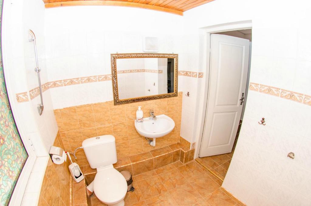 A bathroom at Central GuestHouse Five Corners