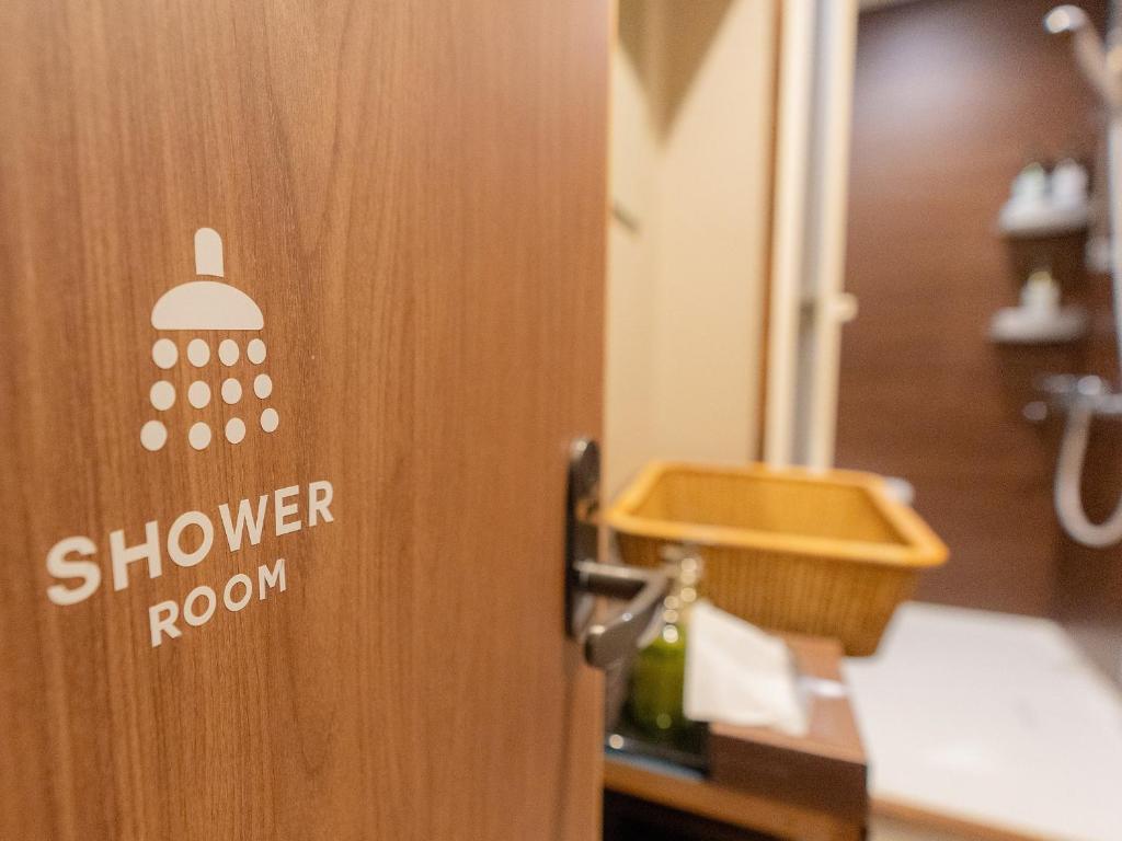 Koupelna v ubytování Nozawa Onsen Azegamikan