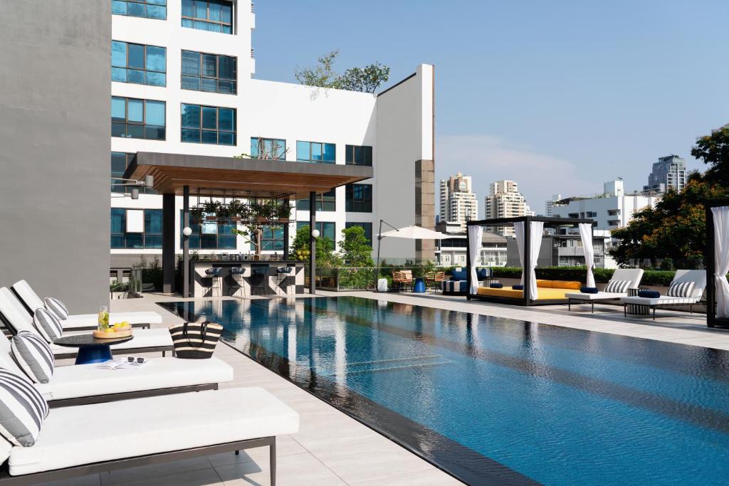 an image of a swimming pool on a building at TRIBE Living Bangkok Sukhumvit 39 by AccorHotels in Bangkok